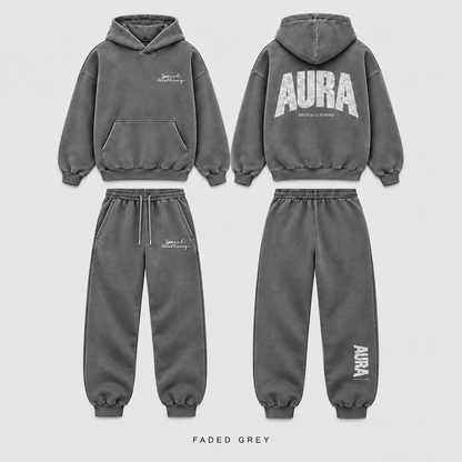 A faded grey two-piece tracksuit set shown from both front and back views, including a pullover hoodie and matching jogger pants, on a light gray background.