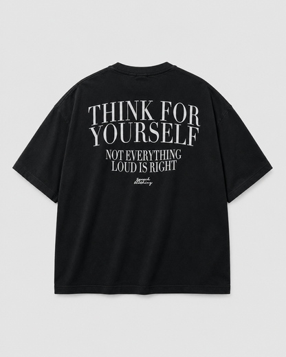 A black short-sleeve t-shirt shown from the back, featuring a bold white graphic text print that reads 'THINK FOR YOURSELF NOT EVERYTHING LOUD IS RIGHT' with a small signature logo below, displayed on a light gray background.