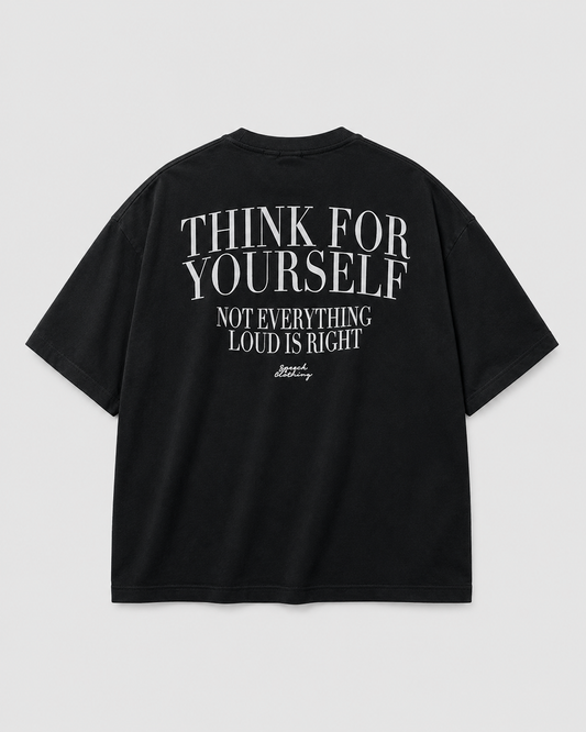 A black short-sleeve t-shirt shown from the back, featuring a bold white graphic text print that reads 'THINK FOR YOURSELF NOT EVERYTHING LOUD IS RIGHT' with a small signature logo below, displayed on a light gray background.