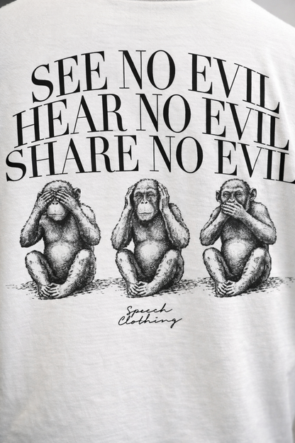 White t-shirt with black text and monkey illustrations on a white background