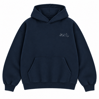A dark navy blue pullover hoodie with a small white script logo on the left chest, displayed against a solid white background.
