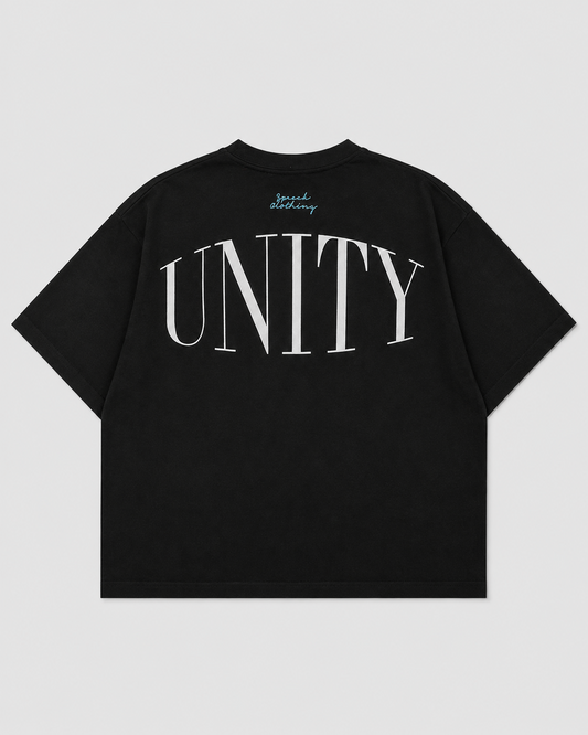 A black short-sleeve t-shirt shown from the back, featuring a large white 'UNITY' text graphic across the back with a small light blue script logo printed above it, set against a solid light gray background.