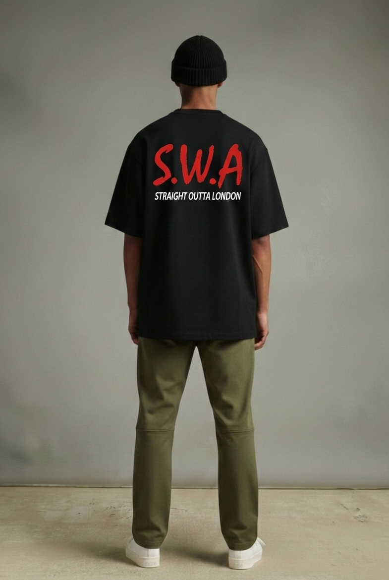 Person wearing a black heavyweight t-shirt with 'S.W.A. Straight Outta London' text, standing against a plain background.